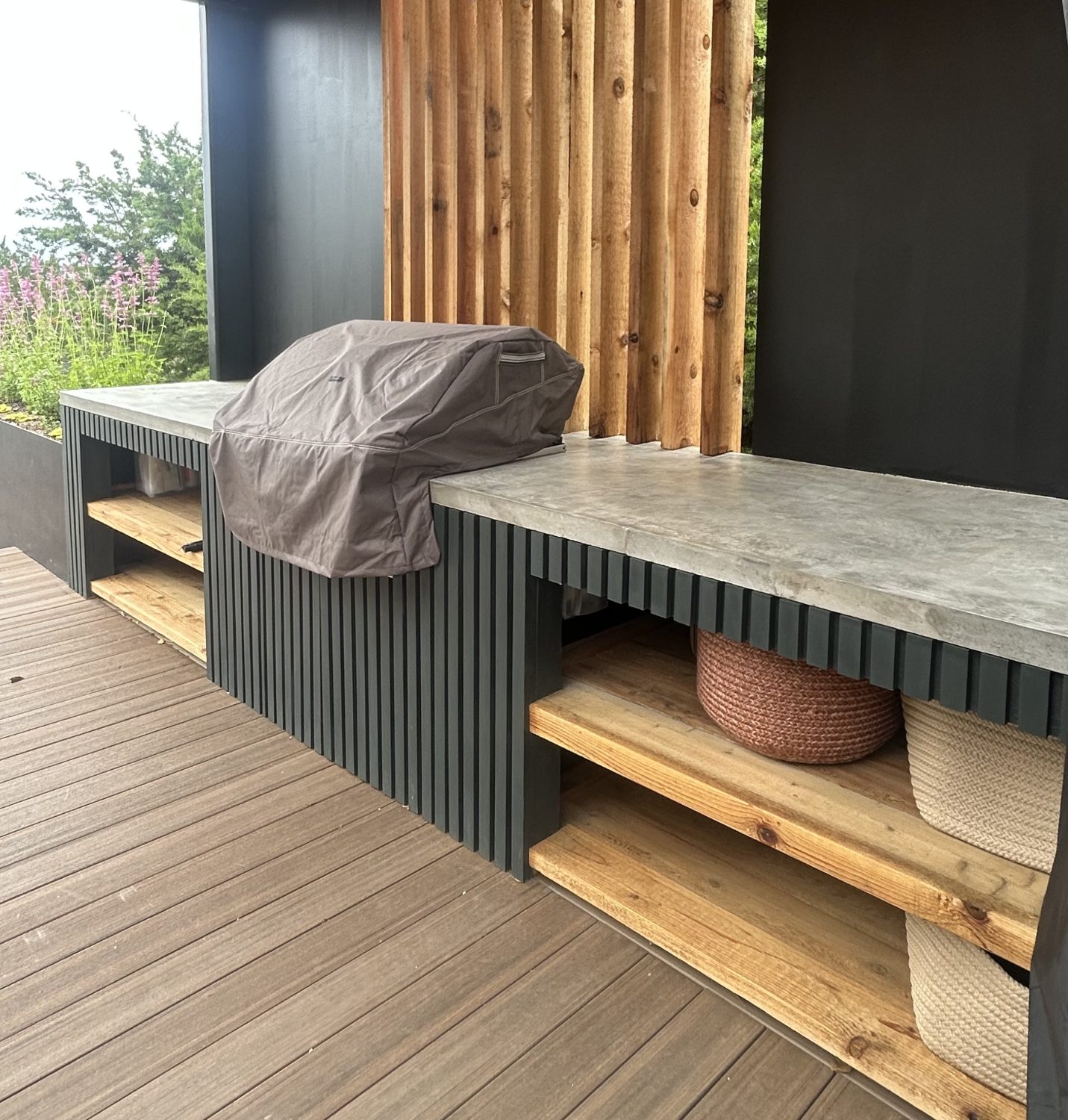 Outdoor kitchen with Open Shelving Landscape Design Austin TX