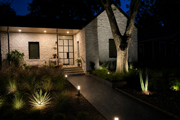 Modern home with landscape lighting